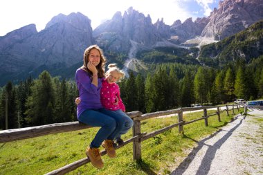 girls sister at the Dolomites  clipart