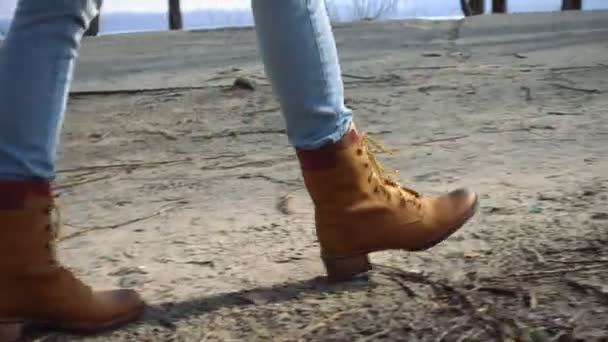 Young girl walking outdoors at the sunny spring day — Stock Video