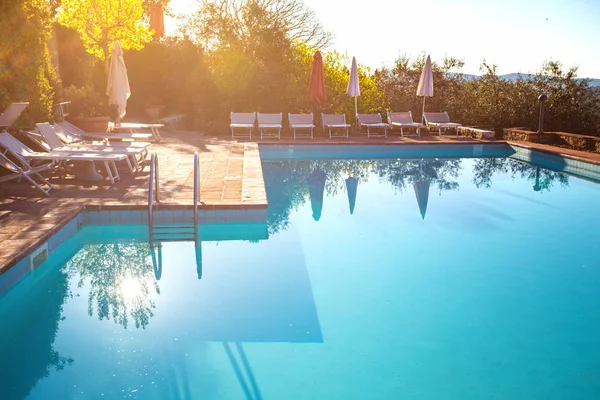 Swimming pool at sunrise — Stock Photo, Image