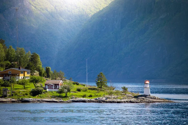 Lighthouse on a fjord shore — Stock Photo, Image