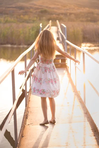 Girl on a bridge — Stock Photo, Image