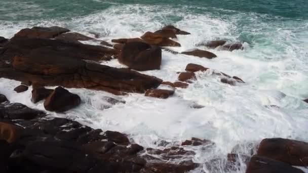 Big waves crashing on stone beach — Stock Video