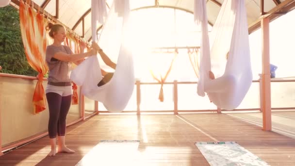 Group Young Women Doing Aerial Yoga Exercises Outdoors — Stock Video