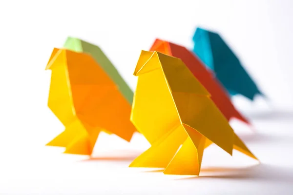 Origami bird made of colored paper — ストック写真