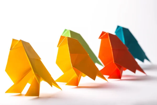 Origami bird made of colored paper — ストック写真