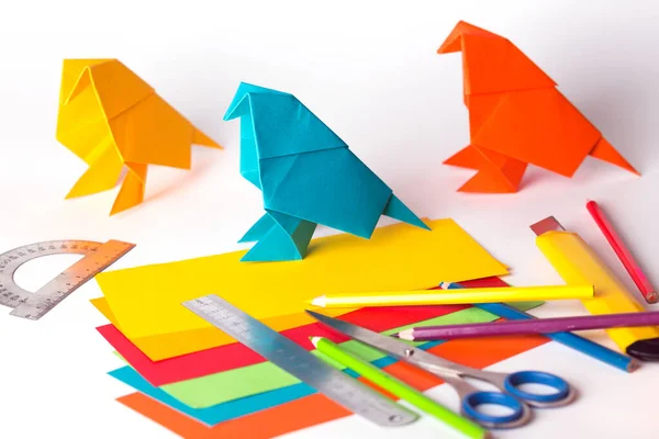 Origami bird made of colored paper — Stock Photo, Image