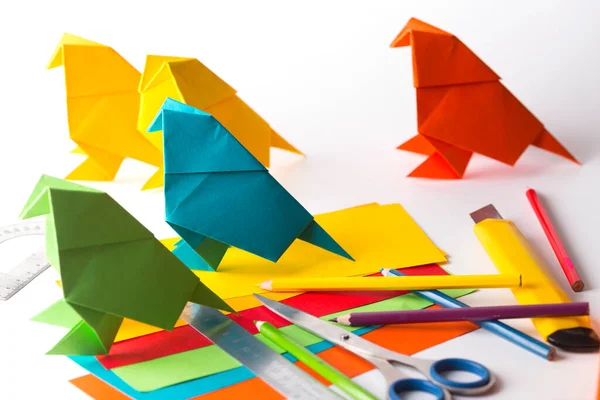 Origami bird made of colored paper — Stockfoto