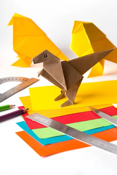 Origami bird made of colored paper — Stockfoto