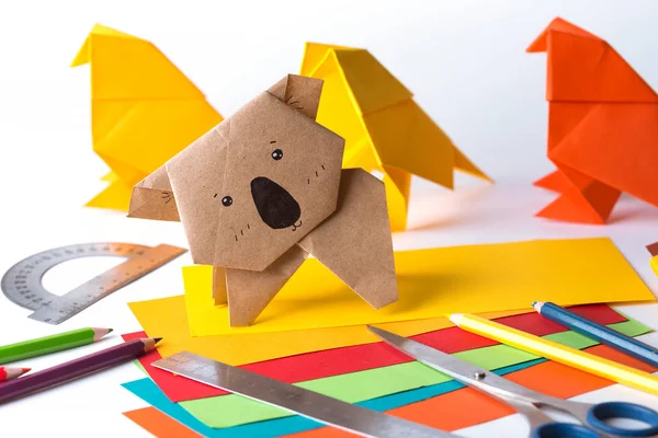 Origami bird made of colored paper — Stock Photo, Image