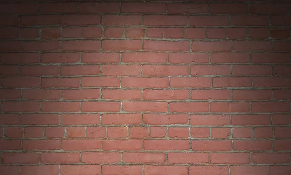 Textura de fondo de pared de ladrillo rojo iluminado dramáticamente —  Fotos de Stock