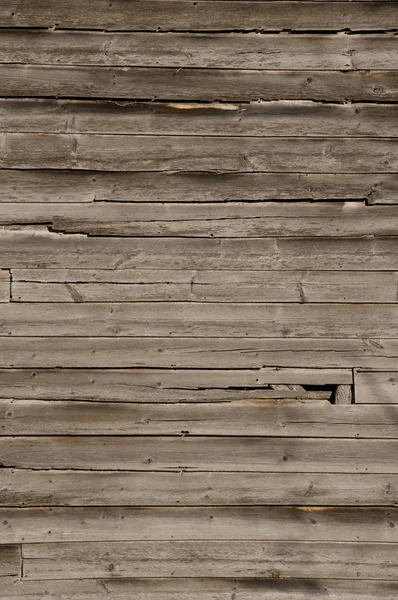 Ξεπερασμένο ξύλινο τείχος με άβαφα σανίδες — Φωτογραφία Αρχείου