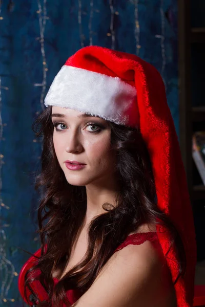 Portrait of girl in Santa's hat — Stock Photo, Image