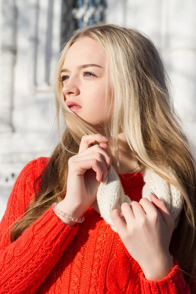 Blonde in a red sweater. Winter portrait — Stock Photo, Image