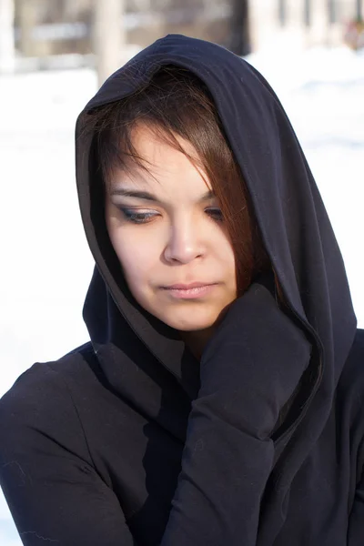 Young girl in a hood — Stock Photo, Image