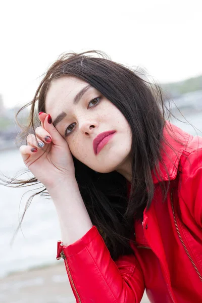 Cauliflower girl in a red jacket — Stock Photo, Image