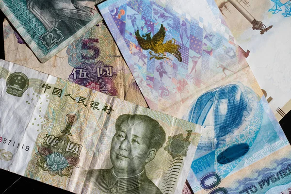 Chinese and Russian money in small bills — Stock Photo, Image