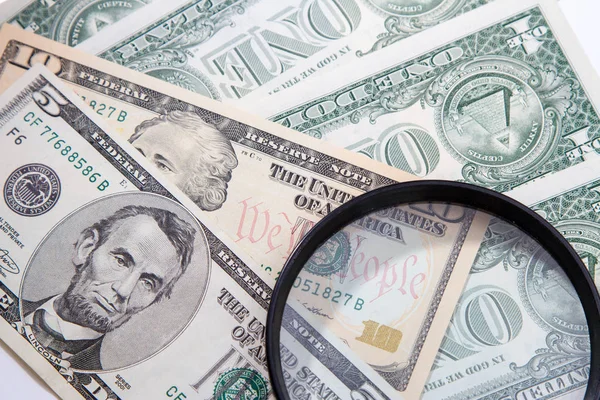 Magnifier Lies Small Bills American Dollars — Stock Photo, Image