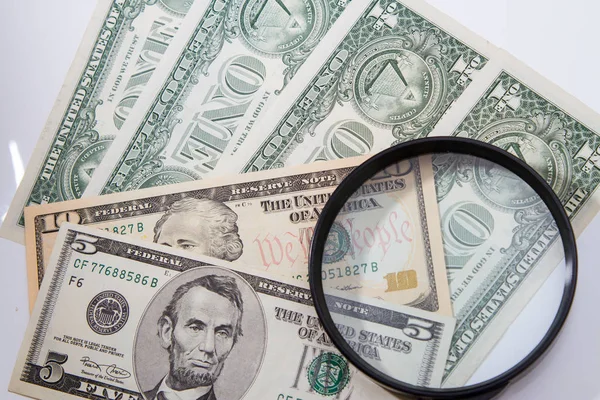 Magnifier Lies Small Bills American Dollars — Stock Photo, Image