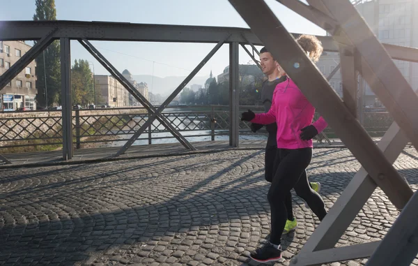 Mladý pár, jogging — Stock fotografie