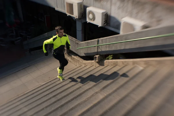 Young man jogging — ストック写真