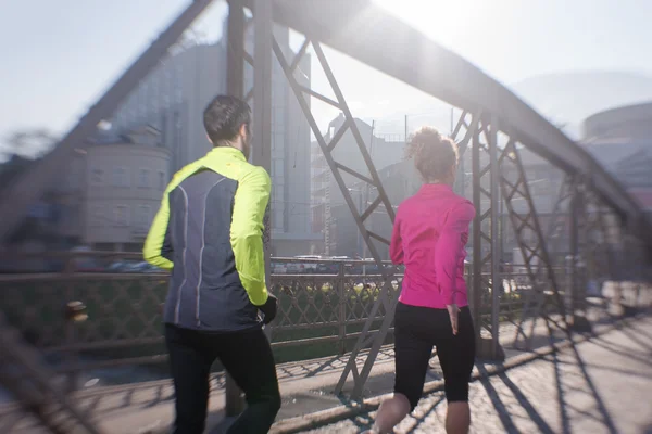 Mladý pár, jogging — Stock fotografie