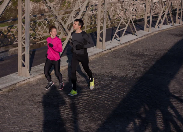 Mladý pár, jogging — Stock fotografie