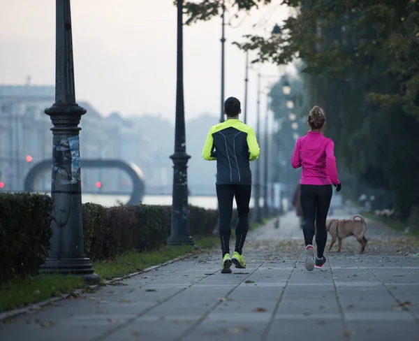 Young  couple jogging — Stock Photo, Image