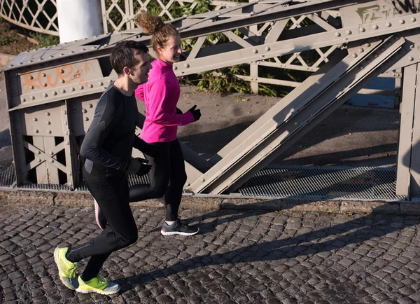 Mladý pár, jogging — Stock fotografie