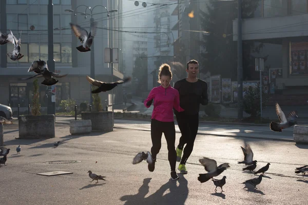 Mladý pár, jogging — Stock fotografie