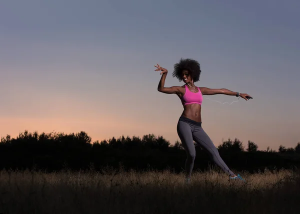 Black woman is doing stretching exercise relaxing and warm up — Stock Photo, Image