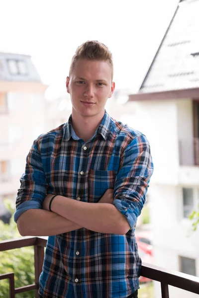 Man standing at balcony — Stock Photo, Image