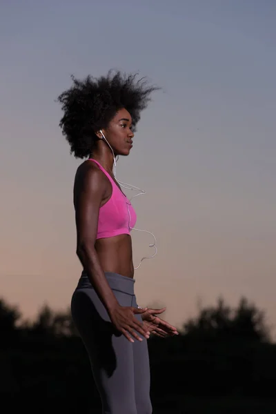 Black woman is doing stretching exercise relaxing and warm up — Stock Photo, Image