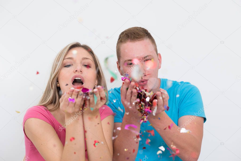 romantic young  couple celebrating  party with confetti