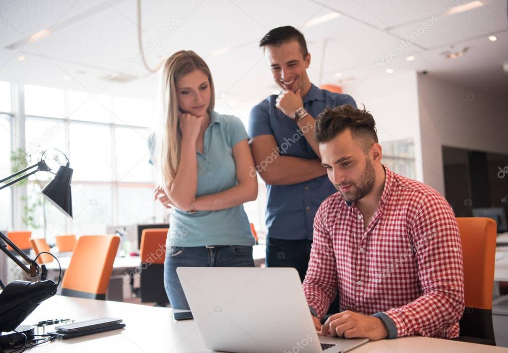 Group of young people employee workers with computer