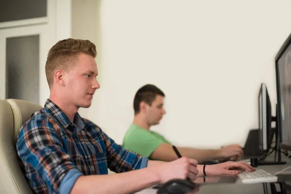 A group of graphic designers at work — Stock Photo, Image