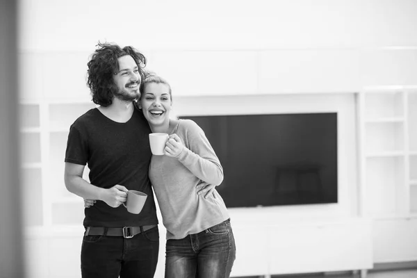 Happy couple in their new home — Stock Photo, Image