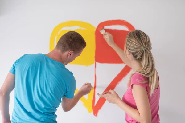 Couple peinture coeur sur mur — Photo