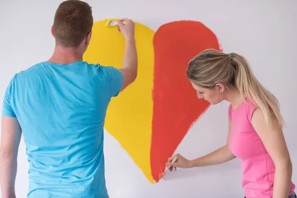 Couple peinture coeur sur mur — Photo