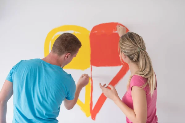 Couple peinture coeur sur mur — Photo