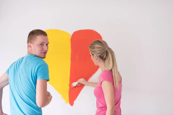 Couple peinture coeur sur mur — Photo