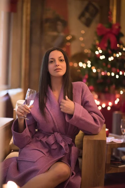 Woman drinking champagne at spa — Stock Photo, Image