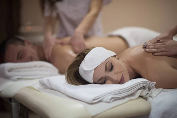 Couple receiving a back massage — Stock Photo, Image