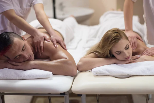 Couple receiving a back massage — Stock Photo, Image