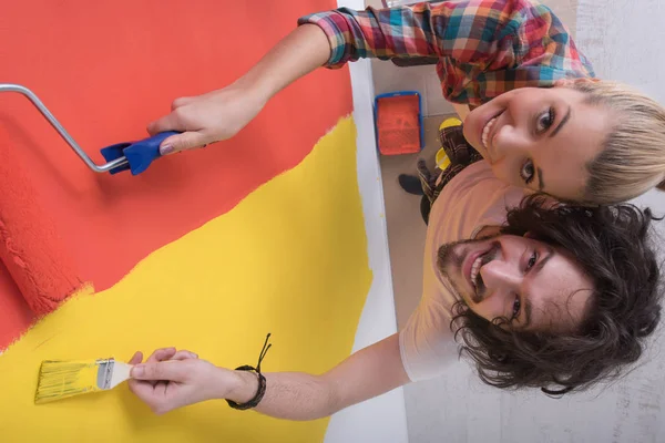 Couple painting interior wall — Stock Photo, Image