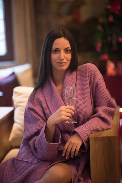 Woman drinking champagne at spa — Stock Photo, Image