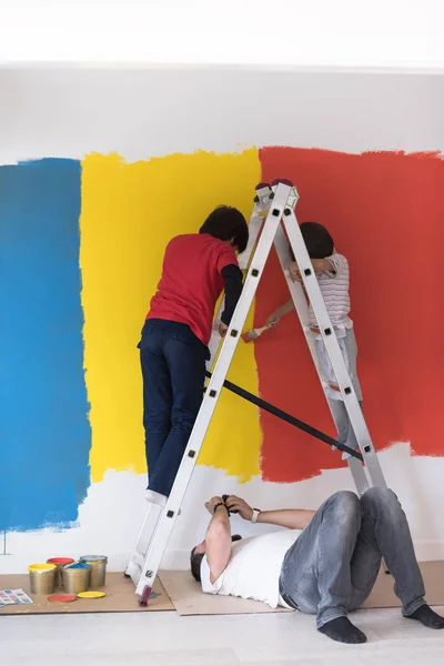 Group Young Boys Helps Paint Wall New Home — Stock Photo, Image