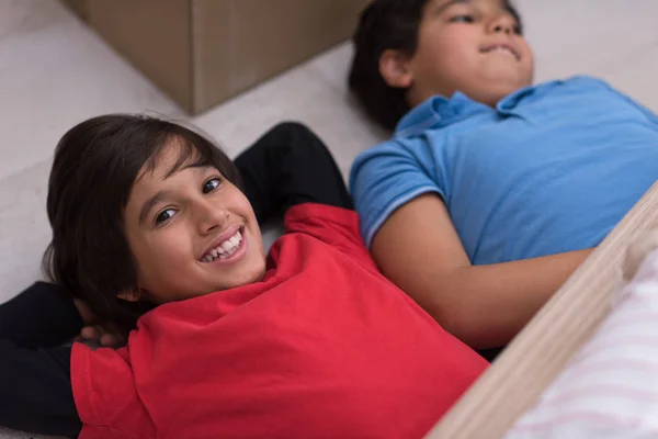 Young boys having fun on the floor — Stock Photo, Image