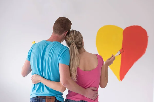 Paar schilderij hart op de muur — Stockfoto