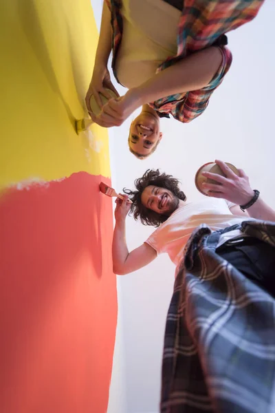 Couple painting interior wall — Stock Photo, Image