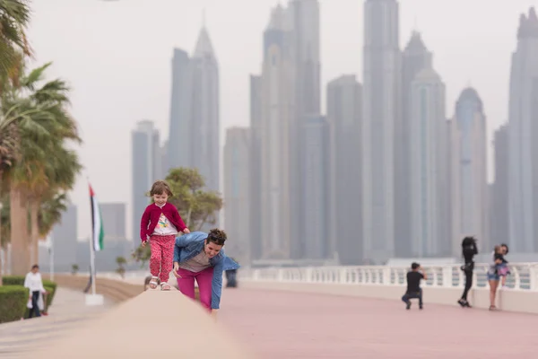 Mother and cute little girl on the promenade — Stock Photo, Image